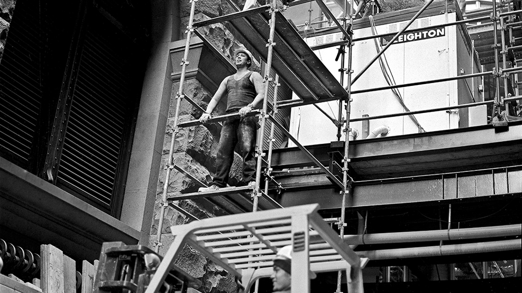 A black and white image of construction workers at the site of City Recital Hall. Image courtesy of City of Sydney Archives, Tim Cole Collection.