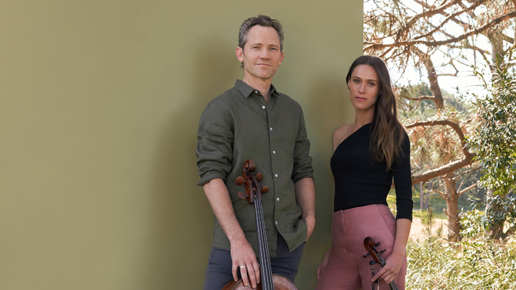 Two musicians from the Australian Chamber Orchestra pose outdoors